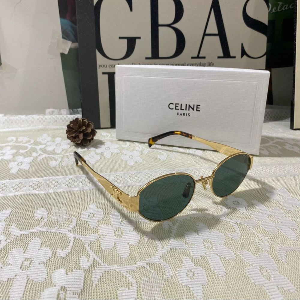 CELINE Gold Frame Oval Sunglasses with Green Lenses